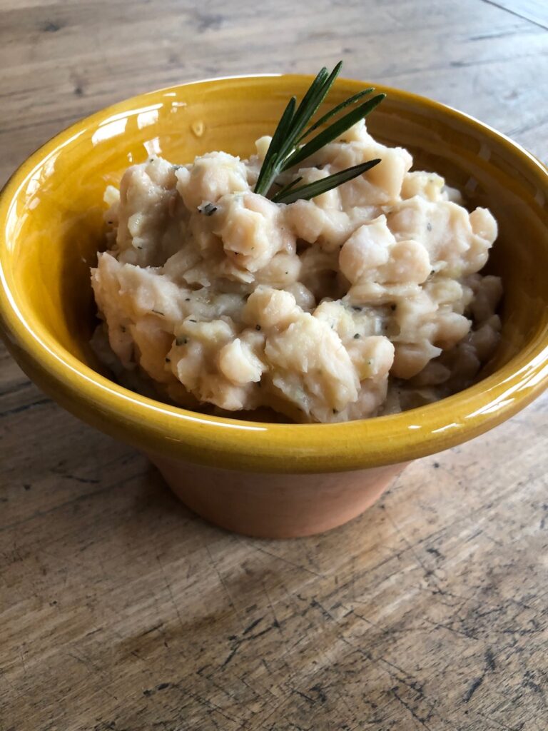 cannellini bean dip in a small serving bowl