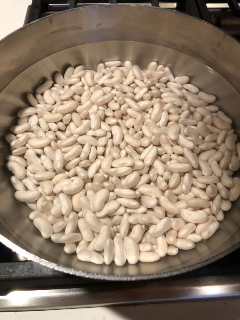 Dried Cannellini Beans covered with a Couple of Inches of Water