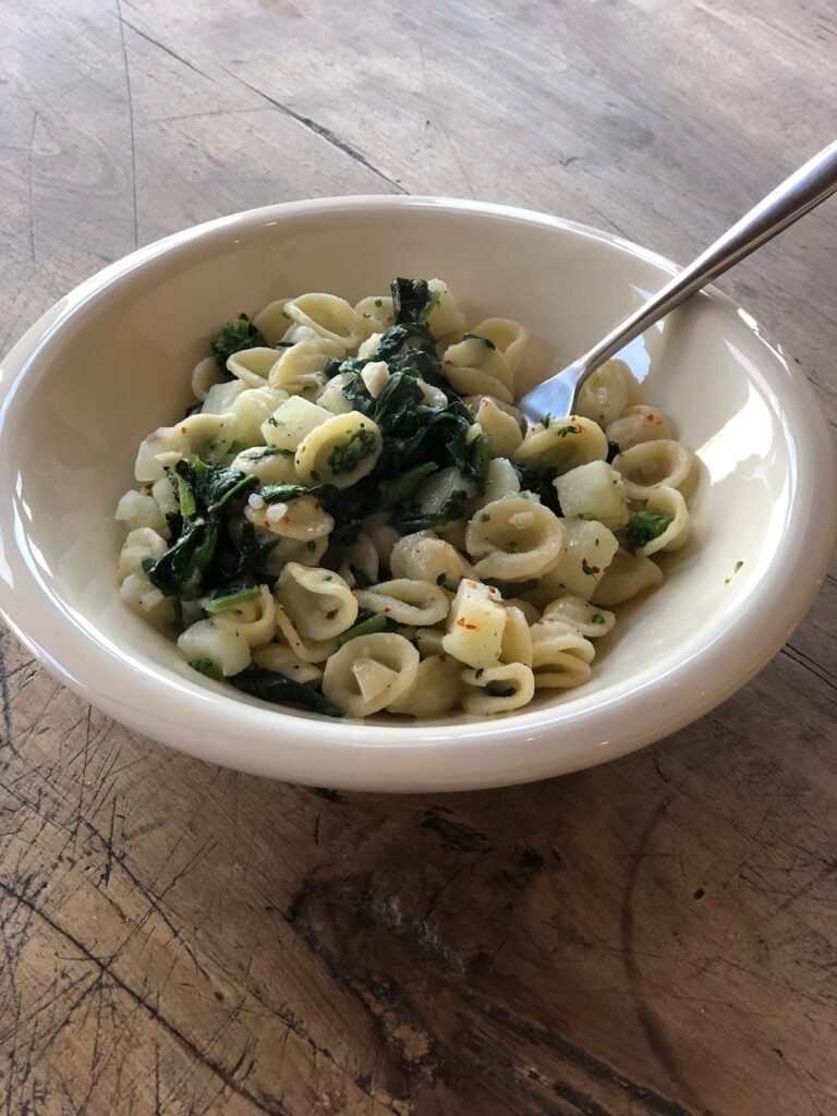 Broccoli Rabe and Potato pasta in a bowl and ready to serve
