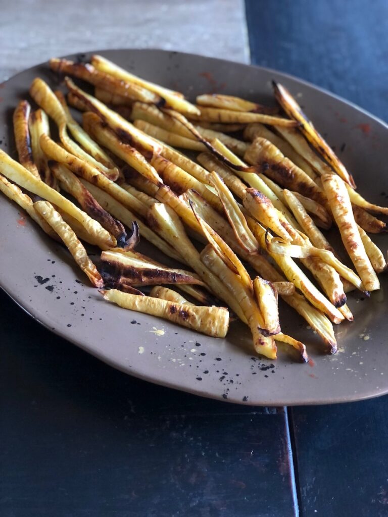A platter of roasted parsnips.