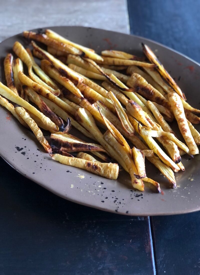 A platter of roasted parsnips.