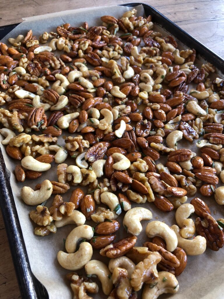 Spreading Nuts on Parchment Lined Pan