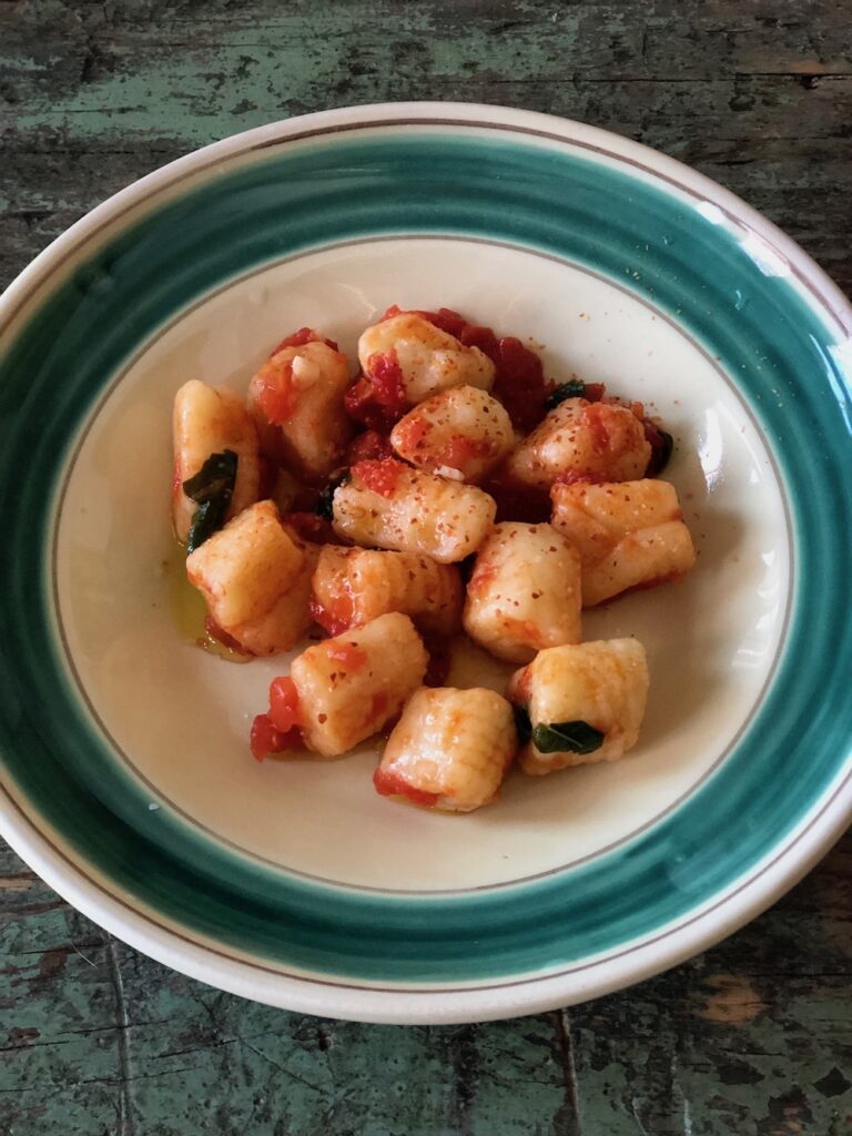 A simple tomato and basil sauce served on potato gnocchi.