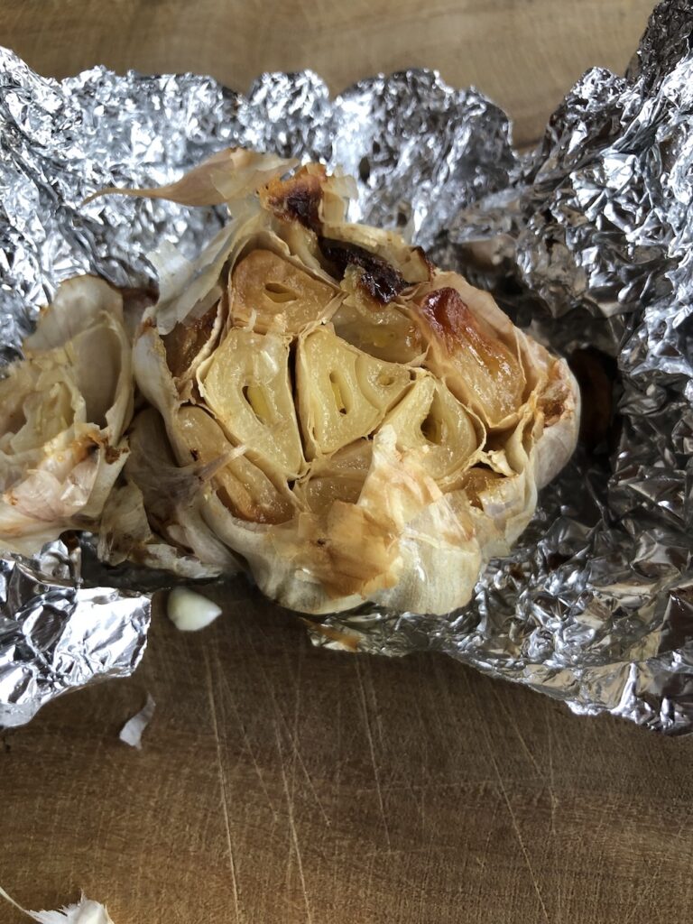 Place the foil packets with the garlic directly on the oven rack