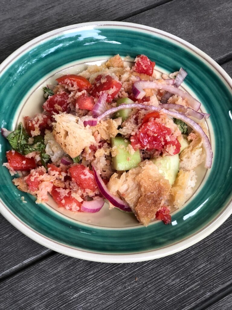 Panzanella salad served in a bowl.