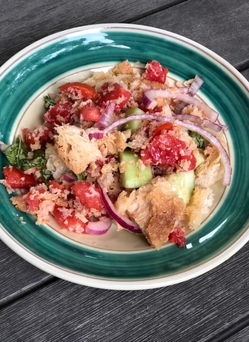 Panzanella salad served in a bowl.