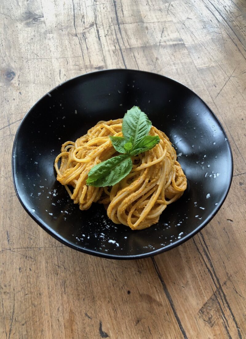 plate of tomato pesto pasta